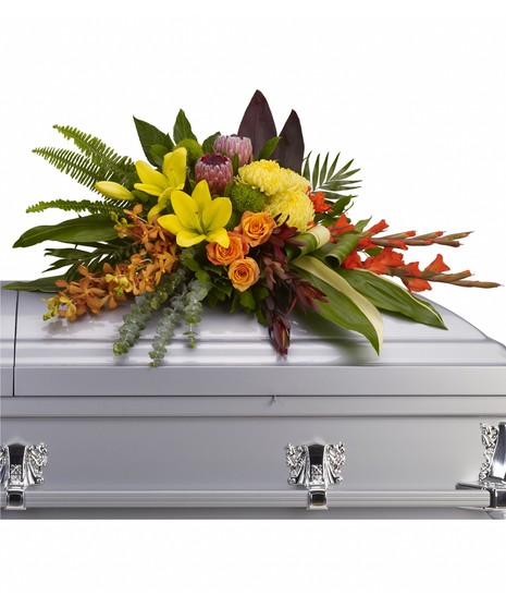 Tropical-influenced casket spray. 